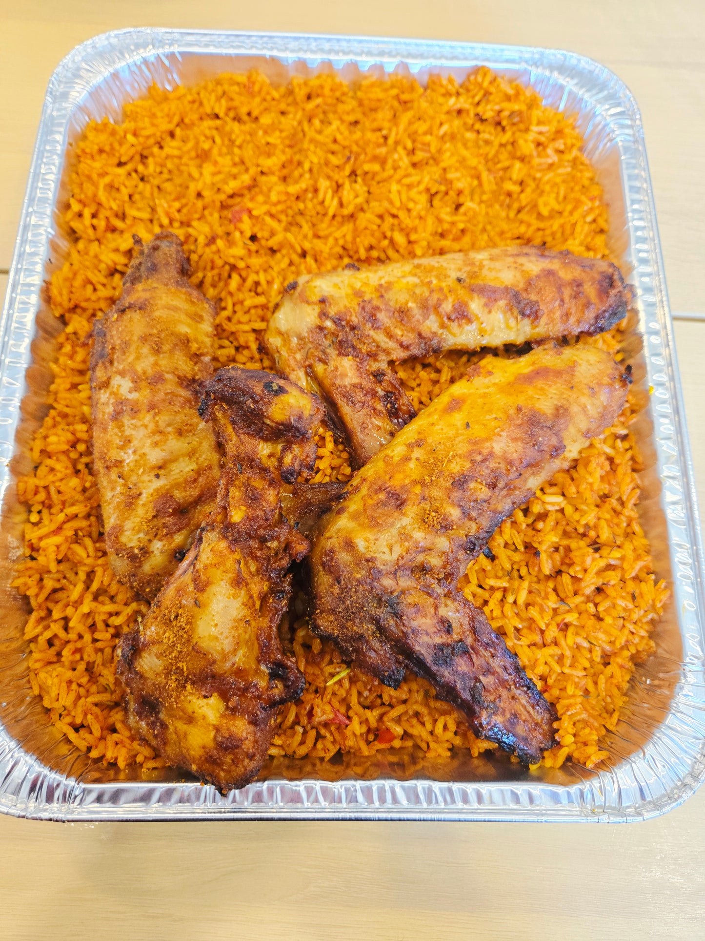 Small tray of Jollof Rice & 4 grilled suya turkey